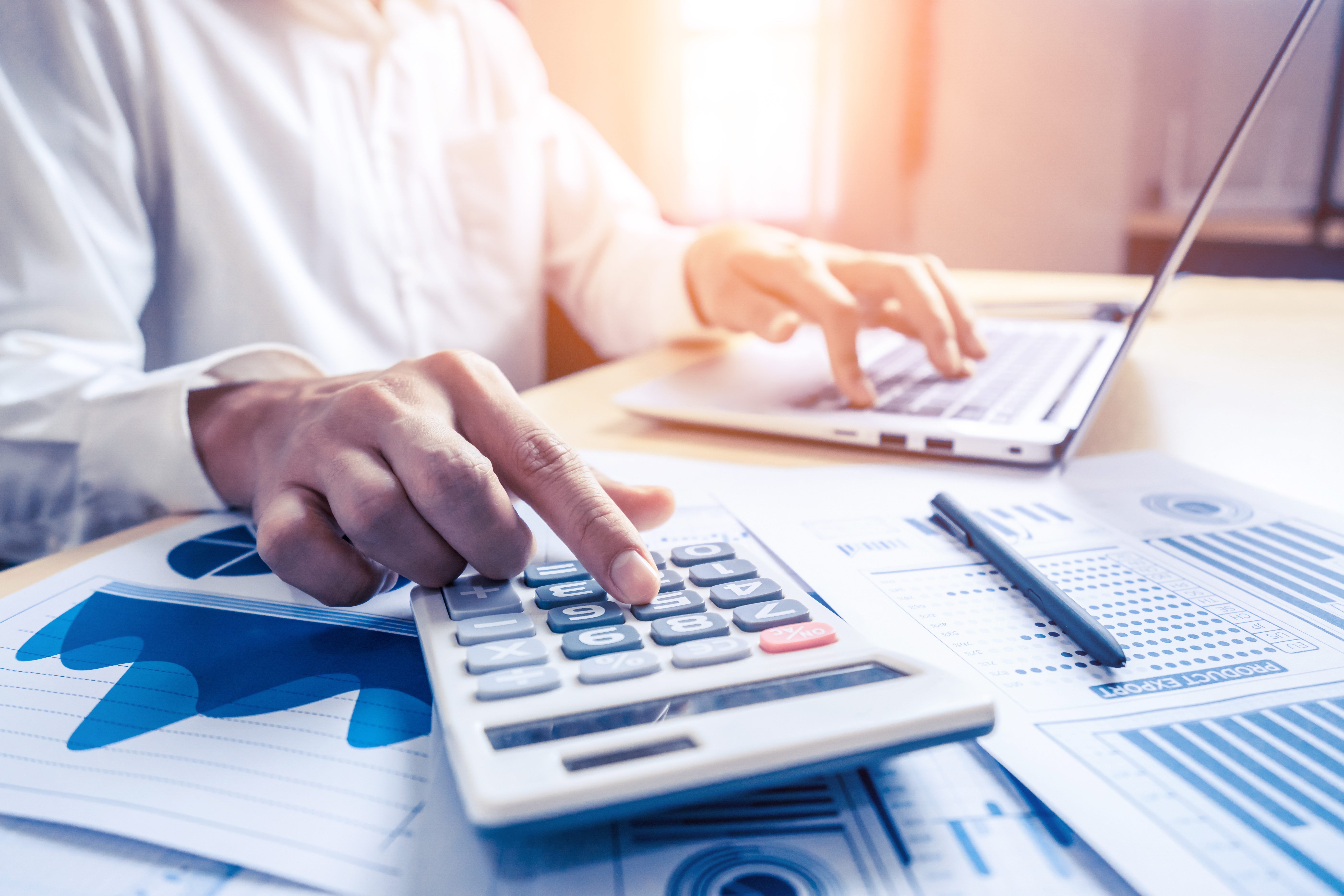 businessman accountant or financial expert analyze business report graph and finance chart at corporate office. concept of finance economy, banking business and stock market research.
